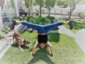 Tracey headstand splits in backyard
